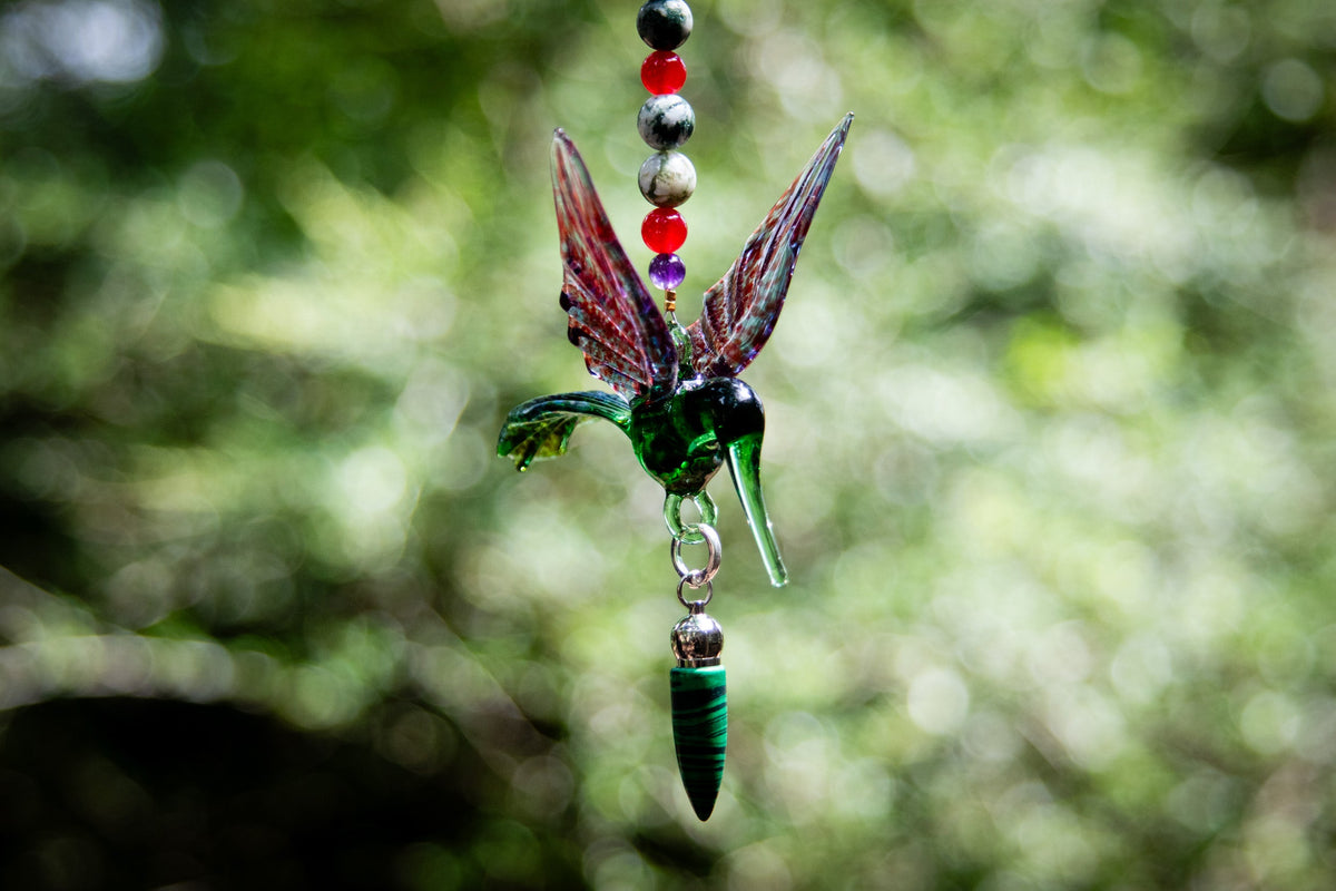 hummingbird with malachite pendant